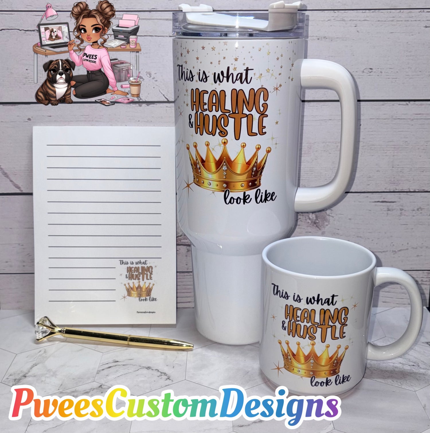 White travel mug and mug with 'Healing & Hustle' design, pen, and notepad on a light wooden surface.