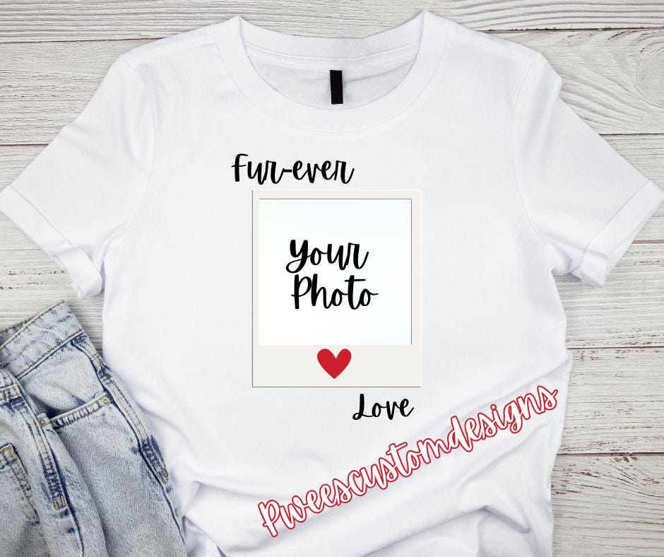 White t-shirt with customizable photo area and text on a wooden surface